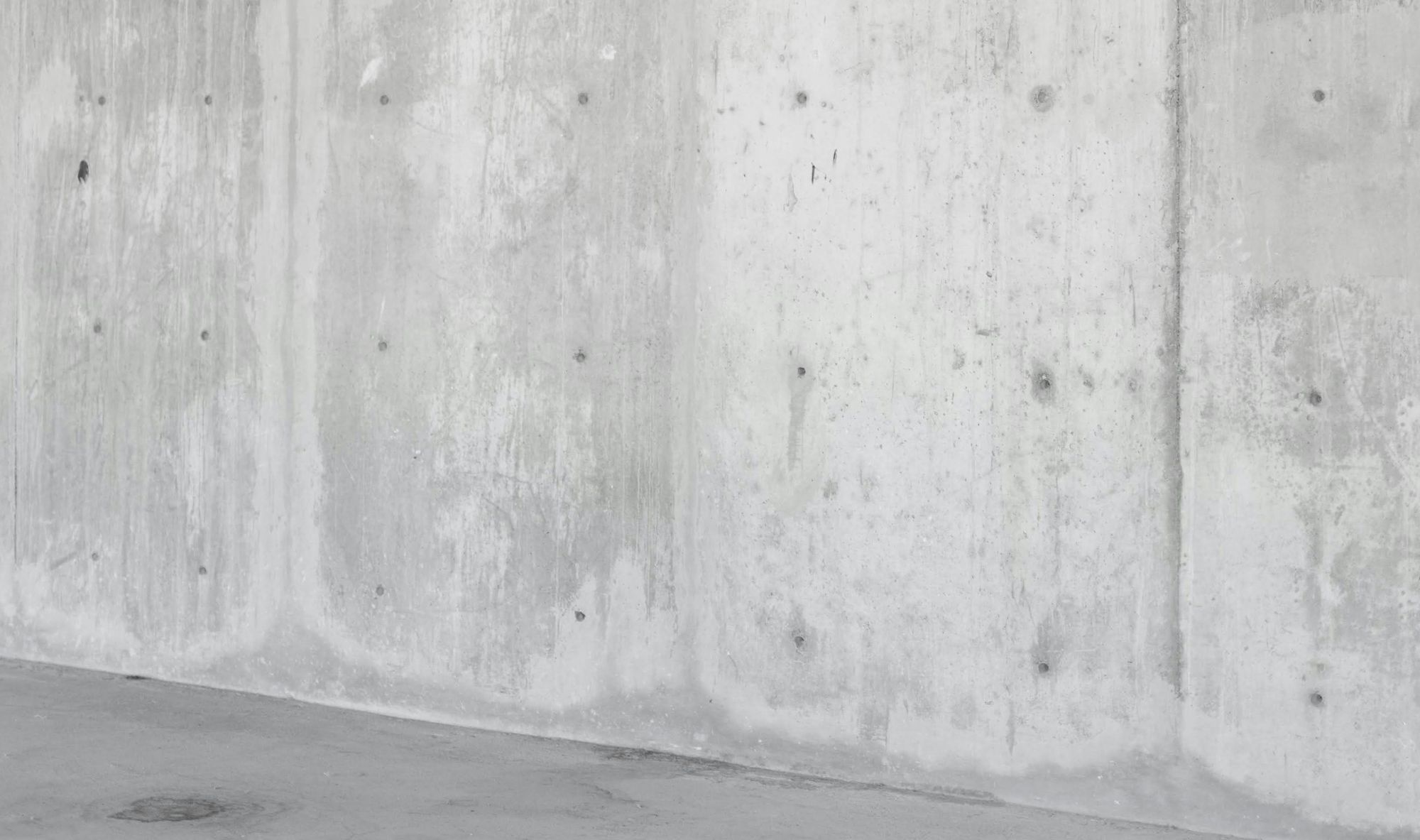 A poured concrete foundation wall